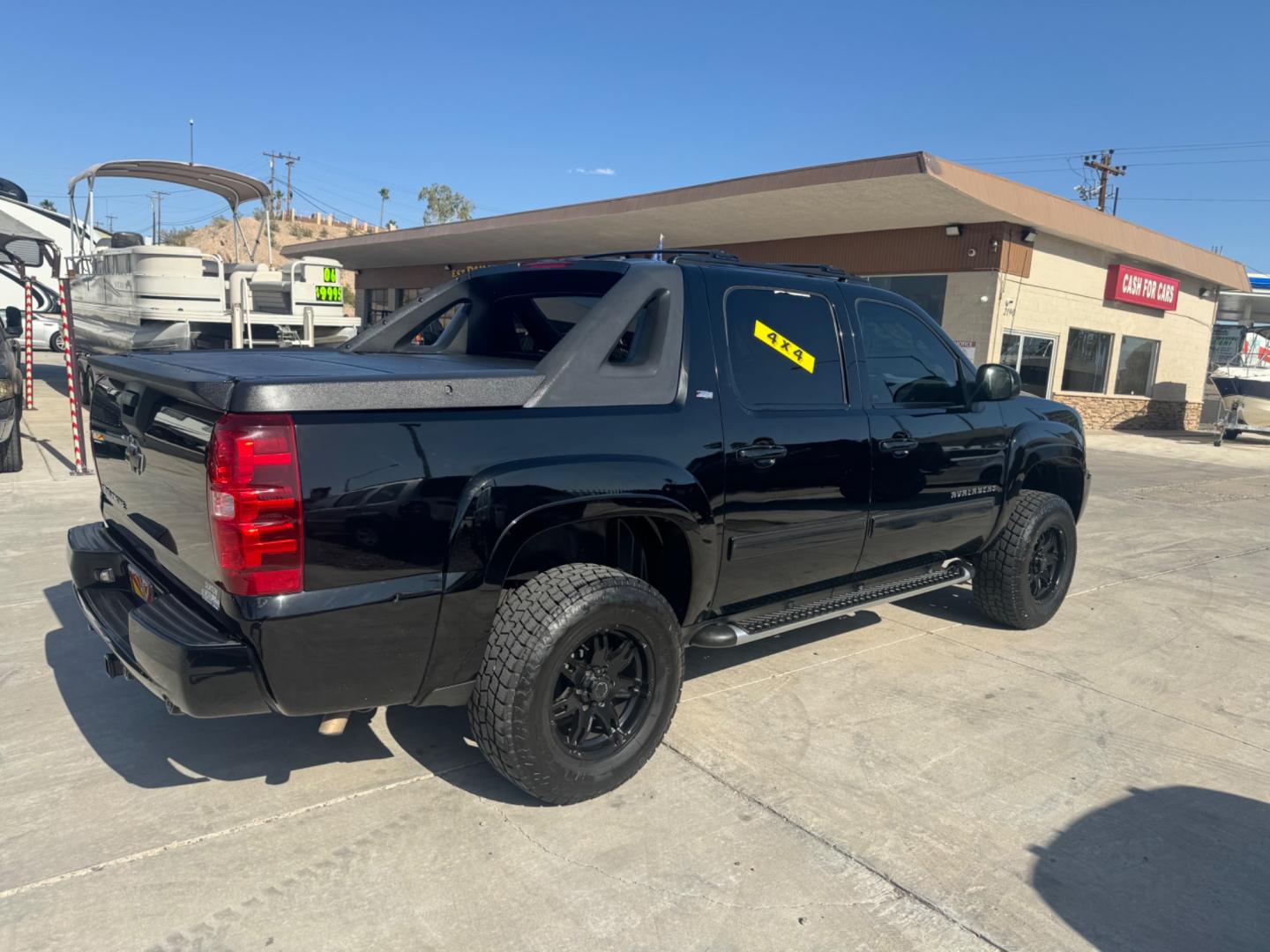 2011 Black /Black Chevrolet Avalanche (3GNTKFE31BG) , located at 2190 Hwy 95, Bullhead City, AZ, 86442, (928) 704-0060, 0.000000, 0.000000 - 2011 Chevrolet avalanche z71 . New motor with receipts . Lots of new parts . Lift kit , custom tires and wheels . 1 owner . Super clean , great running truck - Photo#1